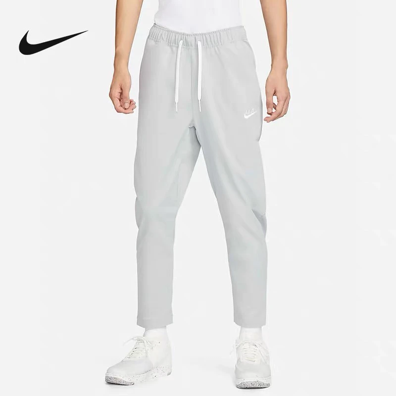 耐克/Nike秋季梭织刺绣logo透气城市机能运动休闲长裤DX0625