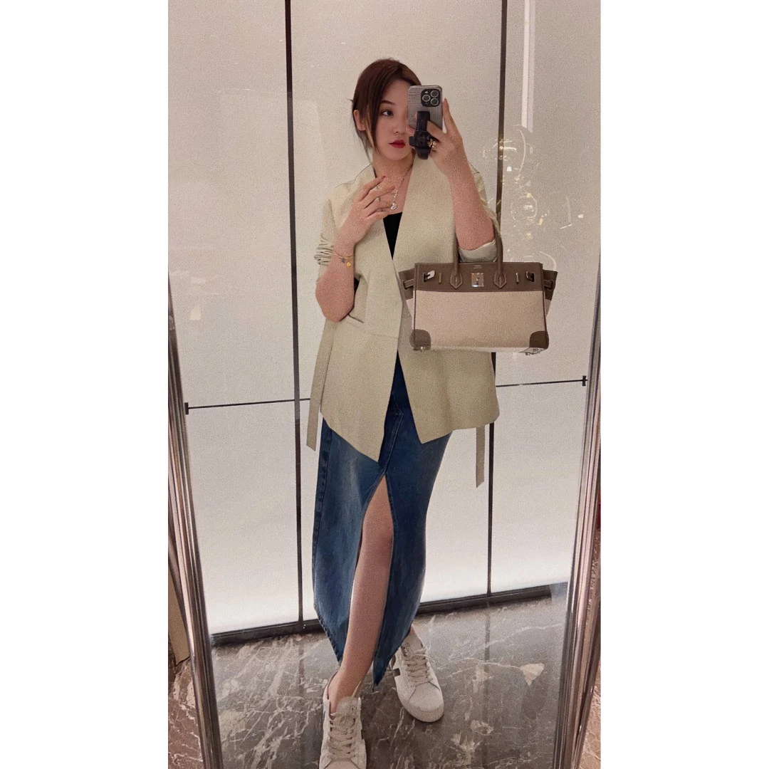 OSENSO“非理性角落”气质长春季时尚休闲前开叉牛仔半裙QZ230121