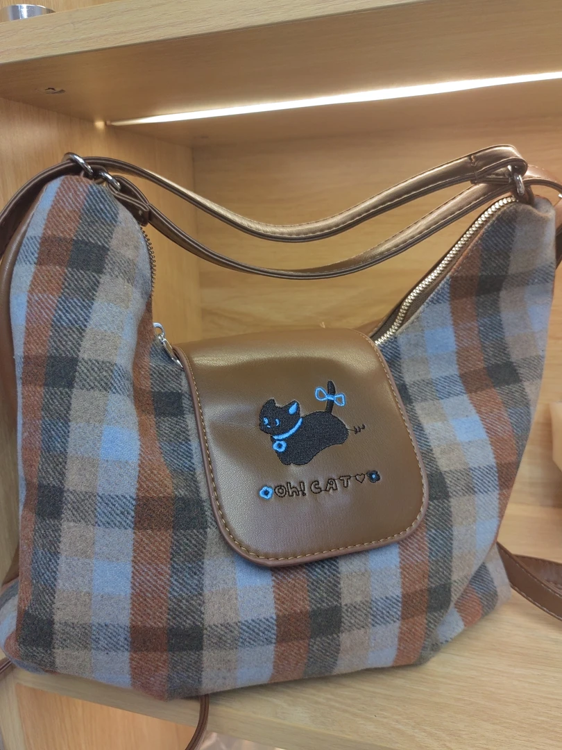 A02搭包斜挎包百大容量单肩高级秋黑猫