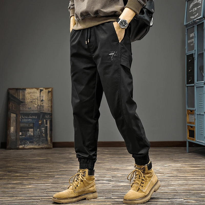 高端秋冬新款字母刺绣休闲裤男美式宽松拼接哈伦裤潮流束脚工装裤