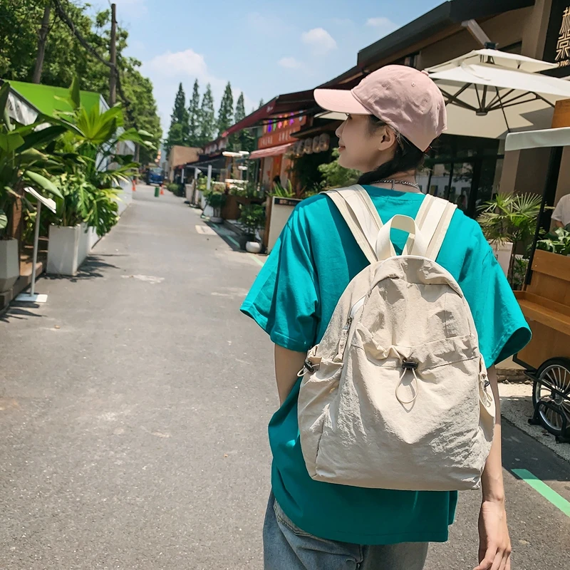 夏季双肩包女2024新款适合旅游的小背包防水女士白色超轻旅行包