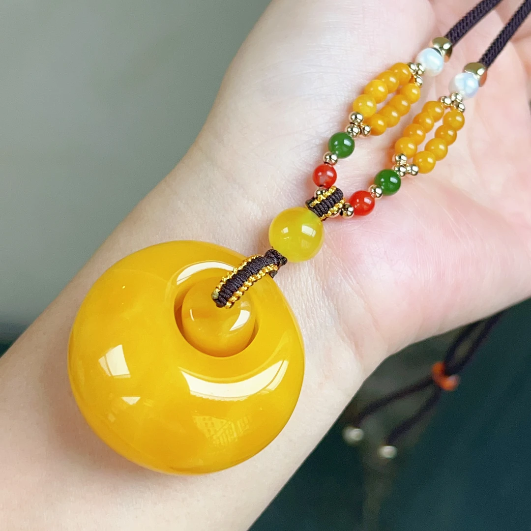 天然蜜蜡鸡油黄子母扣吊坠，20.8克，尺寸4093*22.6mm