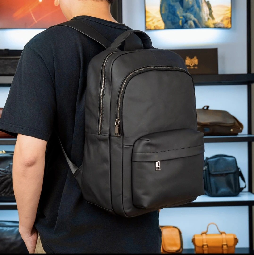 2024新款牛皮黑色双肩包百搭时尚植鞣旅行双肩背包大容量男款女款