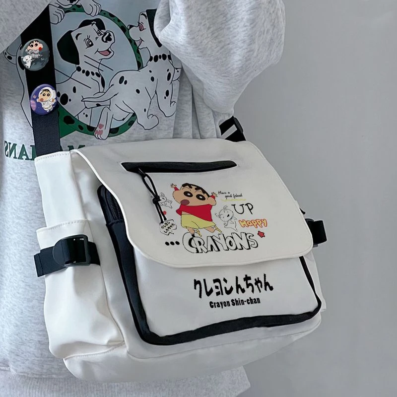 蜡笔小新系列单肩包卡通可爱男生女孩小学生大容量帆布斜挎包背包