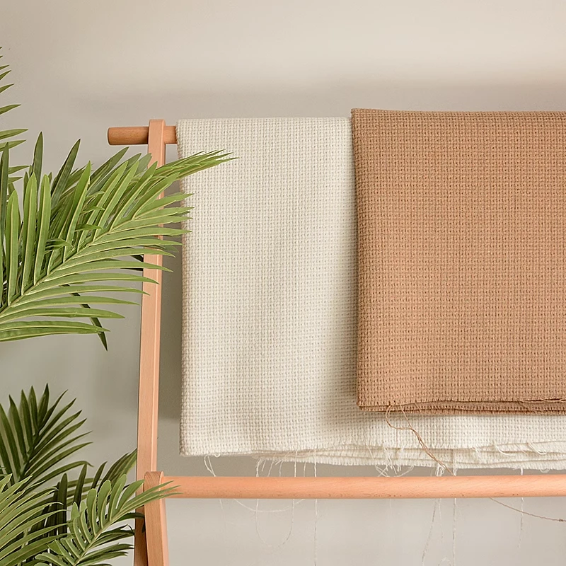 奕帛纺织高档编织毛呢浅棕黄服装面料