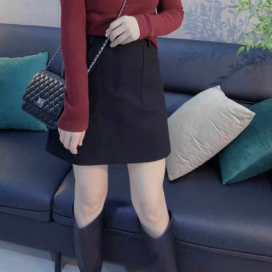 丹丹精选--33910新款一粒扣拉链斜插口袋防走光百搭半裙