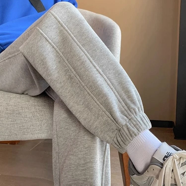 啄木鸟束脚加绒卫裤女秋冬百搭显瘦运动裤加厚新款哈伦宽松休闲裤