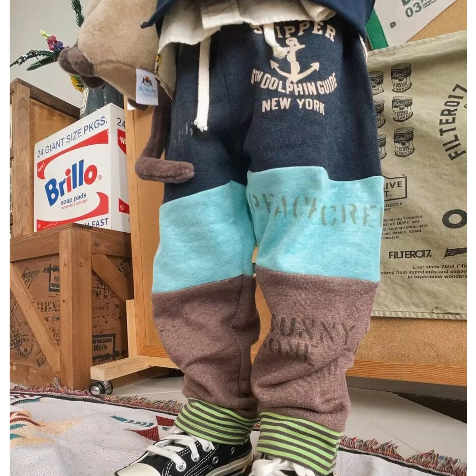 闲闲高品质童装 日系dd儿童时尚拼接卫裤男女童时髦帅气长裤子