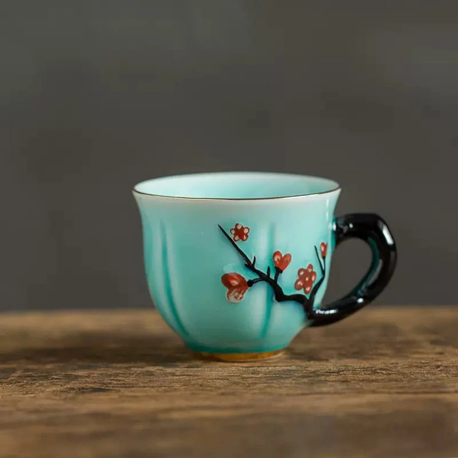 喜迎春梅花浮雕茶杯高温陶瓷品茗杯手绘梅花个人杯描金茶杯带手柄