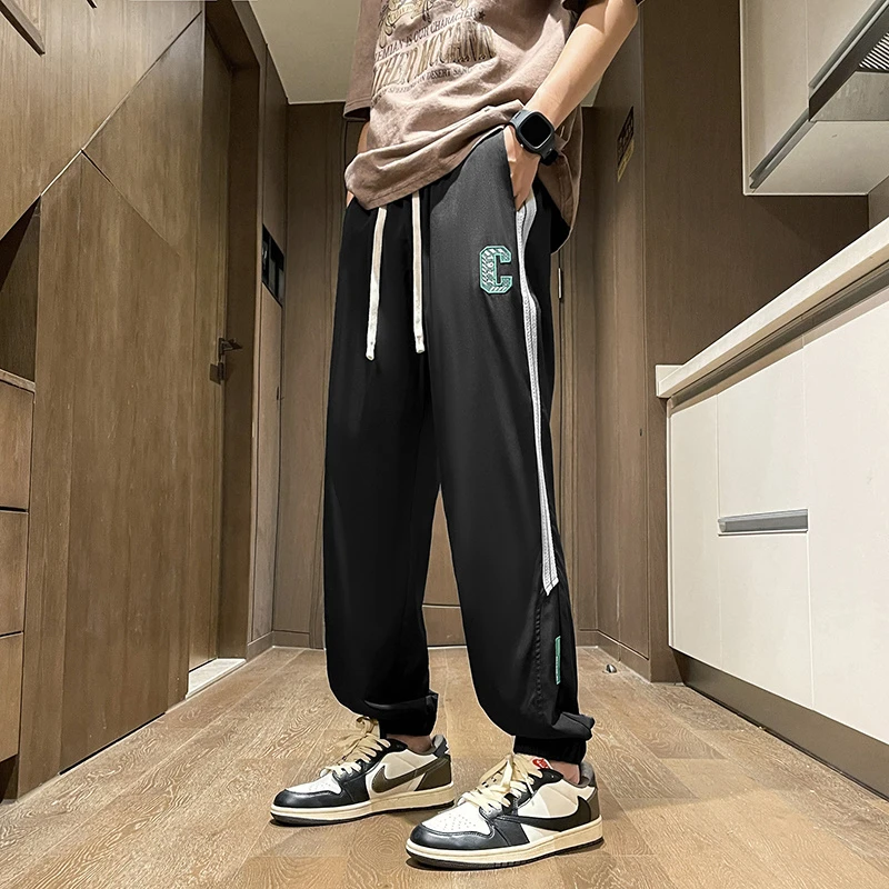 春季新款休闲长裤子男士宽松百搭青少年春秋运动潮流时尚学生卫裤