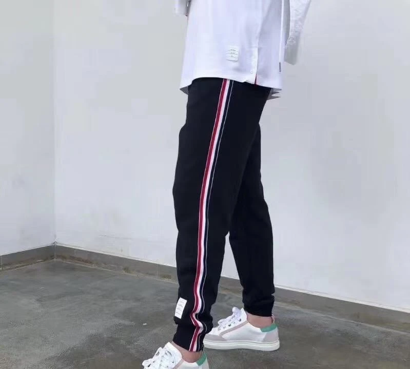 T老师男女经典运动休闲卫裤侧边红白蓝织带口袋束裤三色卫裤