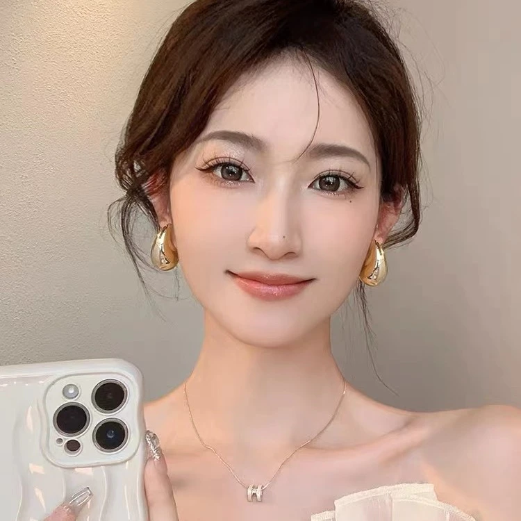铜合金耳饰 金属冷淡风耳钉水滴形耳环女轻奢小众设计高级感耳饰