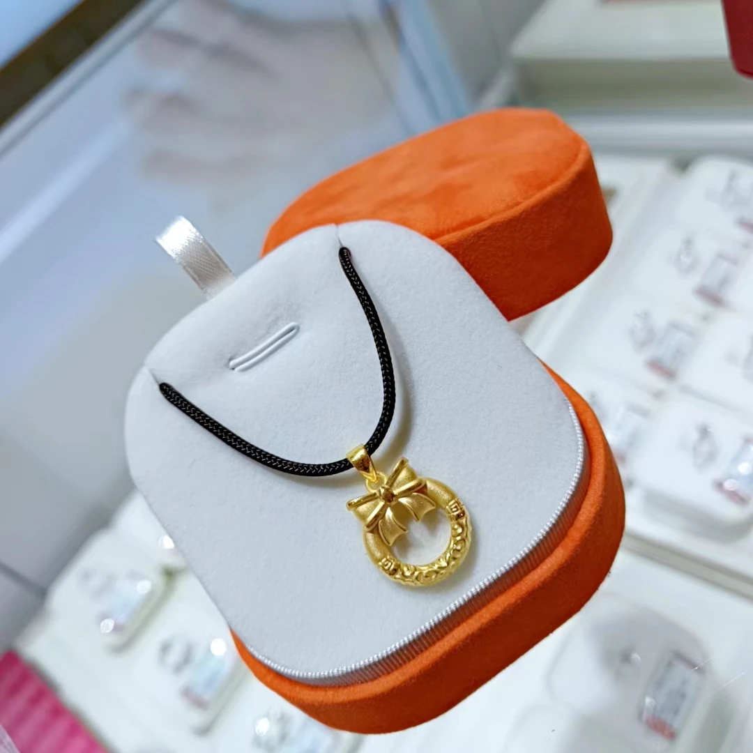 Chow Tai Seng/周大生足金精致蝴蝶结乾坤圈吊坠