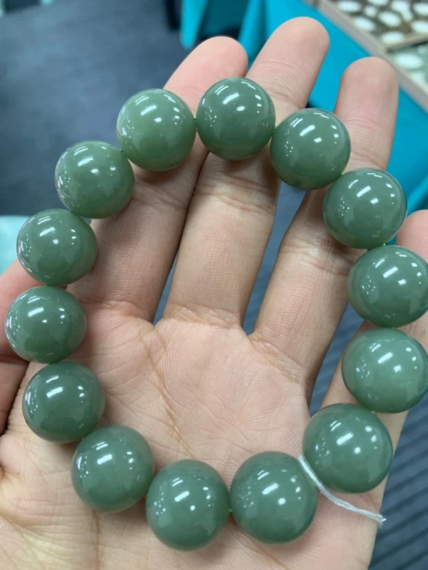 A116 纯天然新疆和田玉沙枣青卡 16