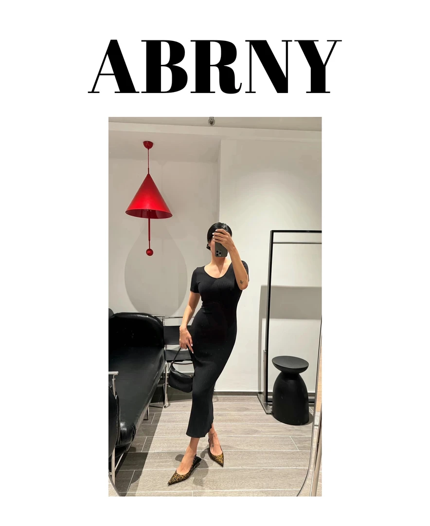 许小黑【巴黎女人】春夏款针织透气修身开叉连衣裙7017