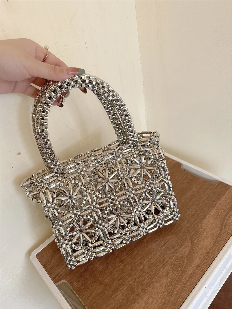 2024高级感复古金属色花瓣手提包银珠花朵金属镂空编织包珍珠包女