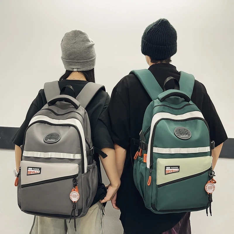 书包男生大学生高中学生背包女初中生小学生五六年级大容量双肩包