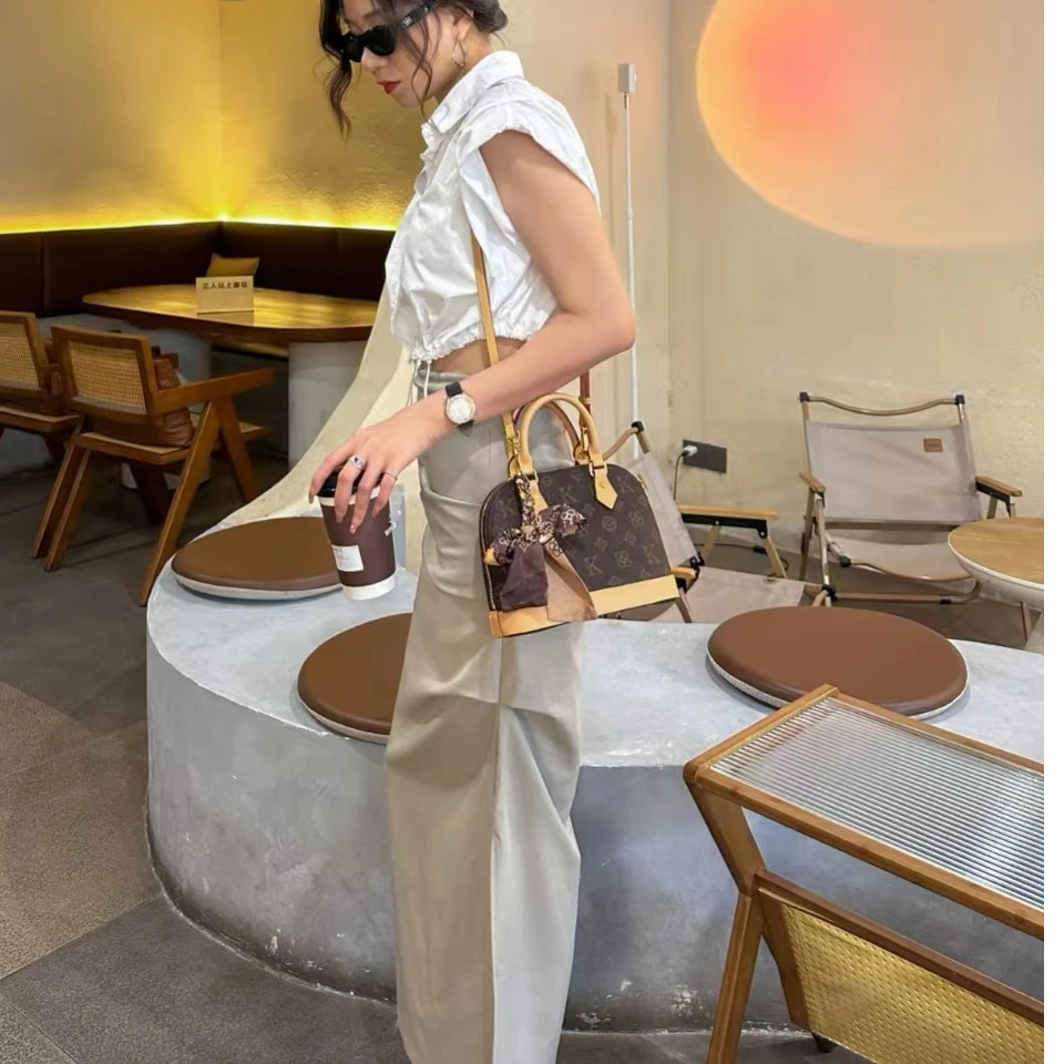 【菲儿甄选】洋气 春秋 复古 法式气质 时尚 设计 新款UK贝壳包