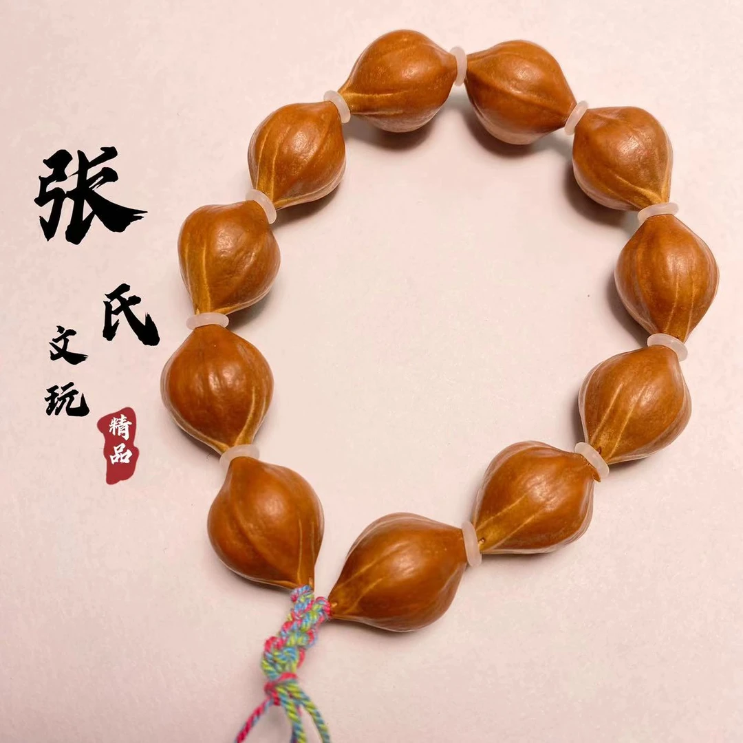 【张氏文玩】橄榄核原皮铁核1.8左右素核手串