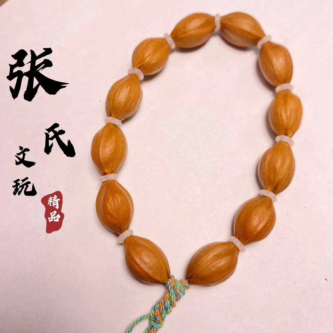 【张氏文玩】橄榄核原皮小尺寸1.2左右素核手串