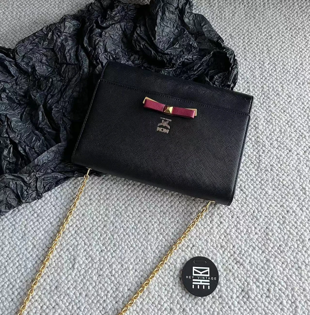 95新 MCM 黑金蝴蝶结 钱包 19cm 9104091