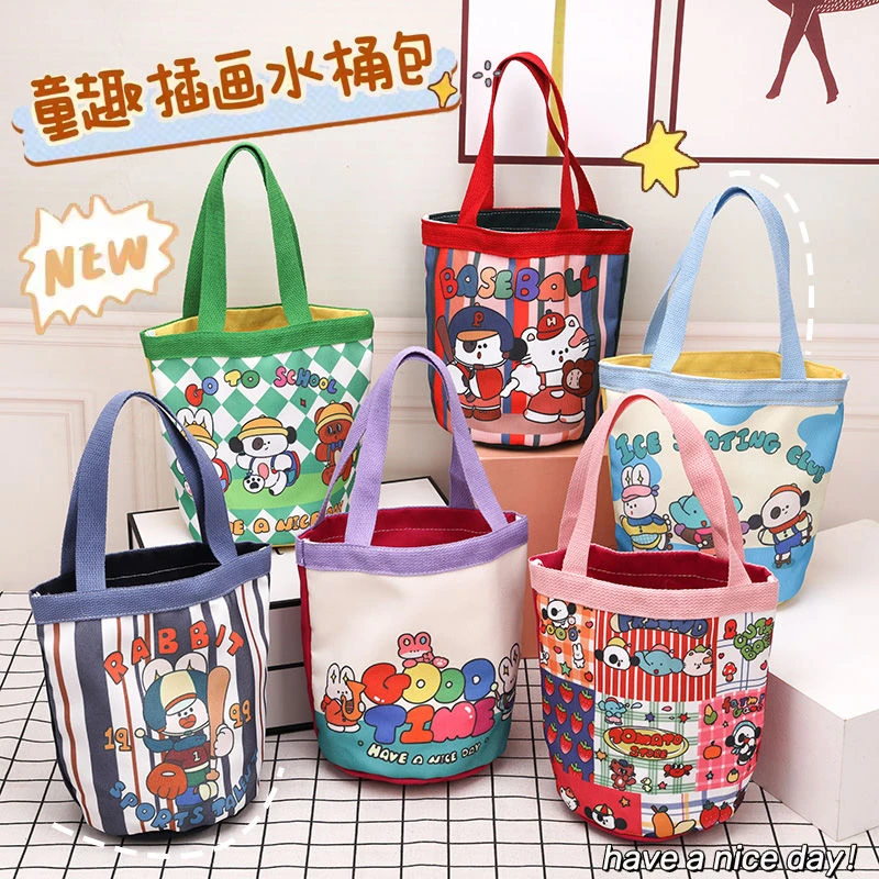 可爱插画小狗水桶型手提帆布包韩风少女心妈咪包便当袋上班小拎包