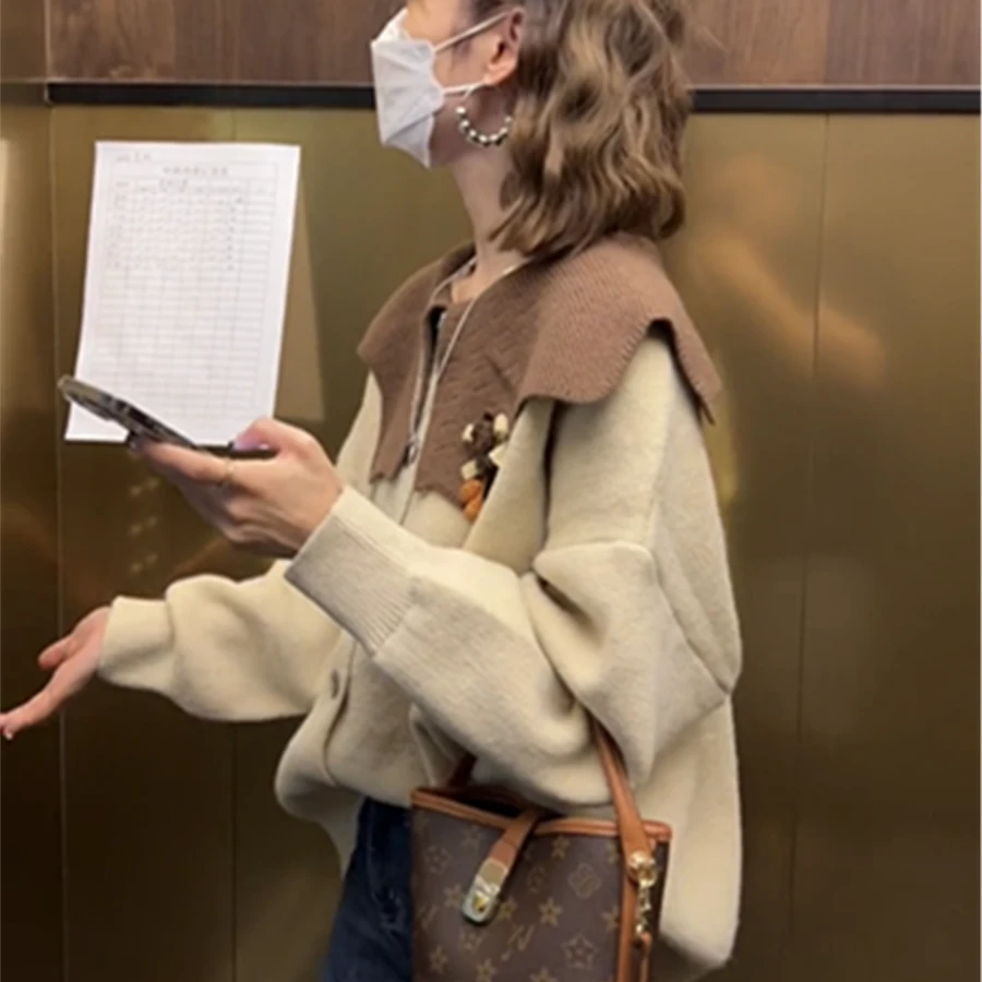 秋冬新款减龄学院风洋气撞色娃娃领温柔单排扣针织外套毛衣开衫女