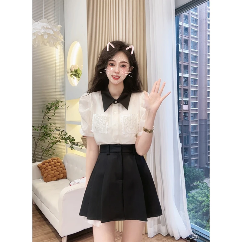 2023夏季甜美气质翻领系扣蕾丝贴袋泡泡袖衬衫上衣