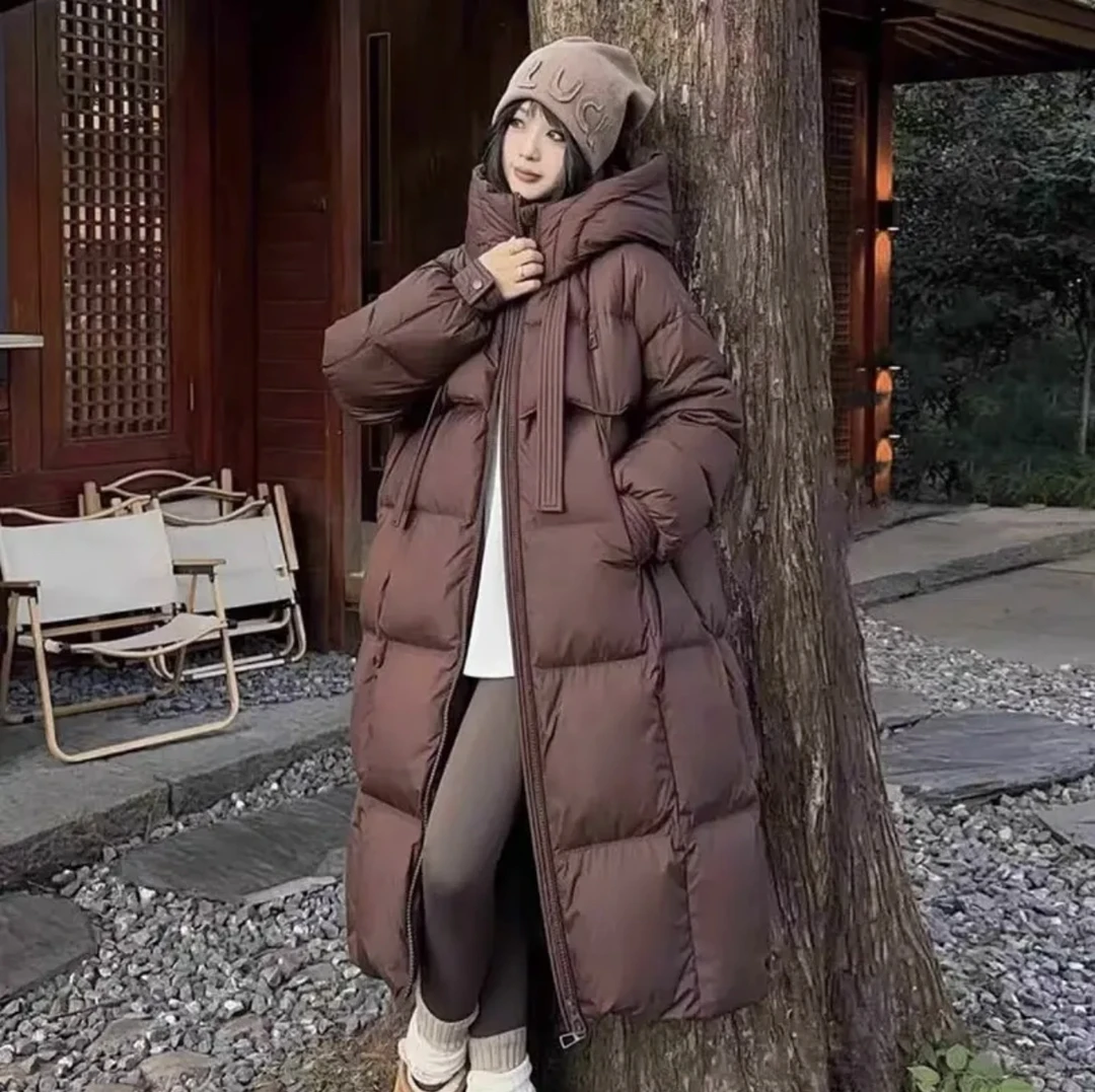 【静静推荐】冬季新款中长过膝羽绒服女连帽加厚宽松飘带保暖鸭绒