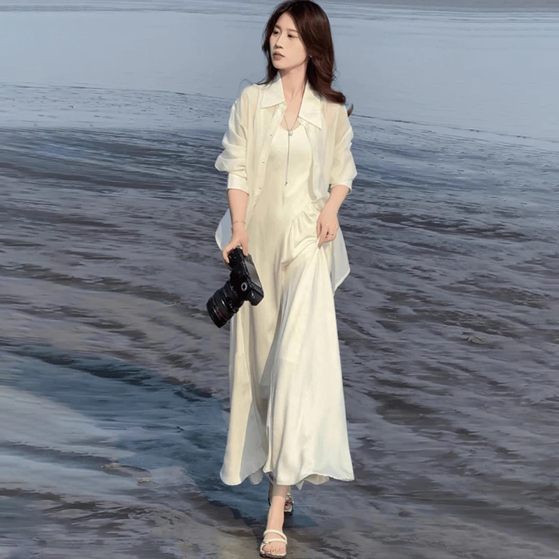 清凉夏季时尚新款吊带V领连衣裙米白色气质法式复古小众收腰长裙