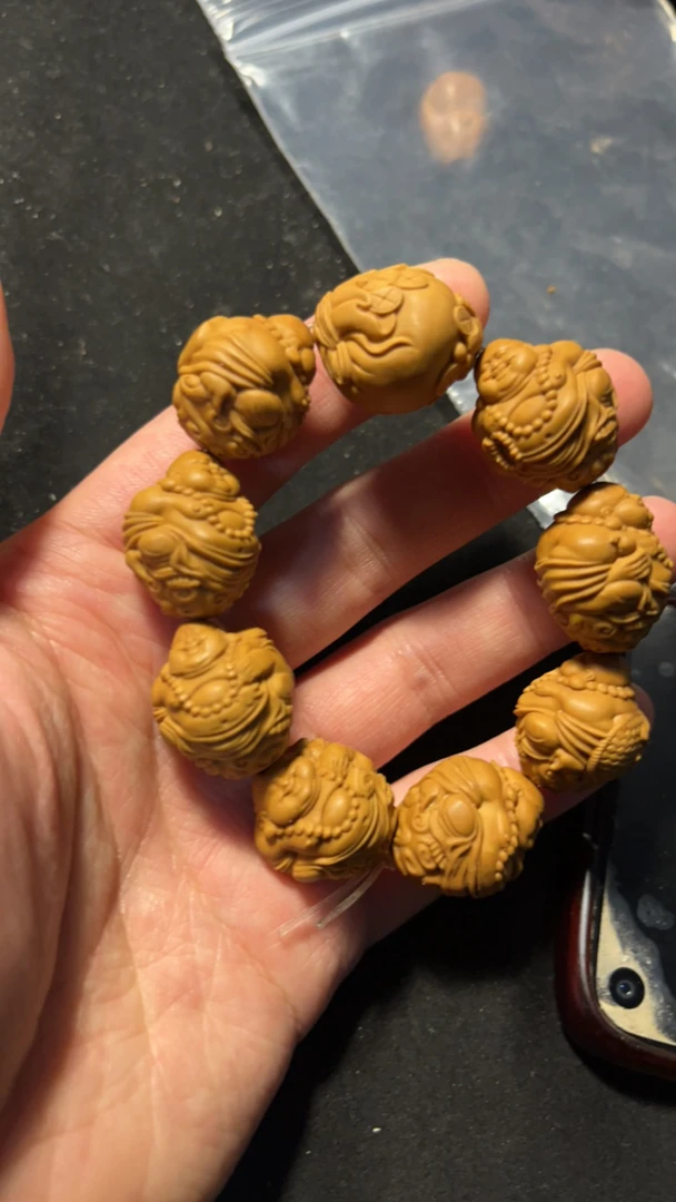 橄榄核八大弥勒雕刻手串