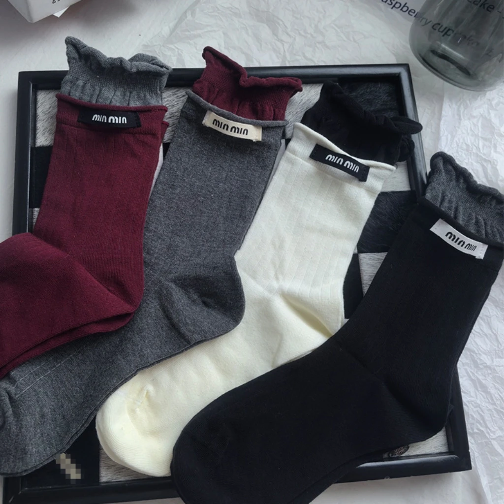 安可拉红色袜子女秋冬韩版酒红拼灰中筒袜布标min字母木耳花边袜