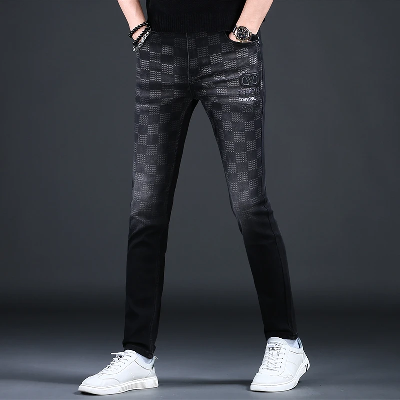 欧版牛仔长裤秋冬黑色印花爆款修身弹力高端刺绣百搭潮牌小脚新款