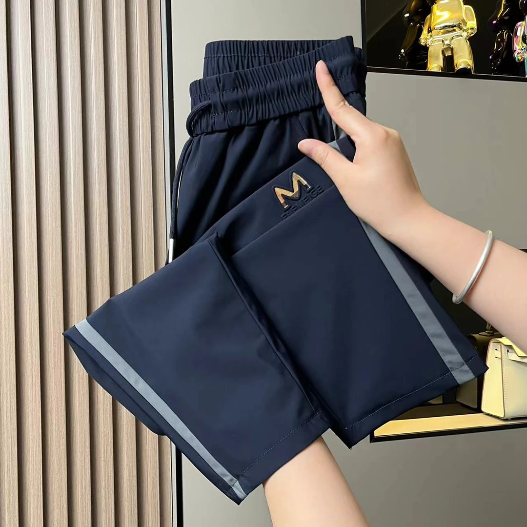 夏季时尚冰丝小脚裤弹力透气薄款潮流商务垂感百搭舒适女裤