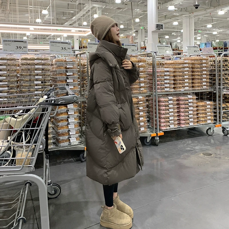 灰色连帽白鸭绒羽绒服女2025冬季长款过膝宽松加厚中戏面包服外套