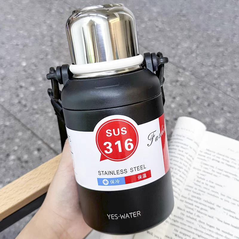 【主播宠粉】900毫升大容量背带手提一盖两用保温壶户外真空黑色