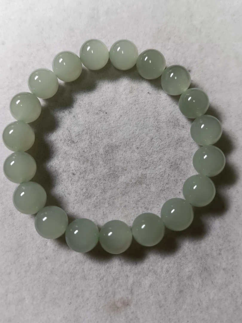 和田玉高冰晴水猫眼10mm手串