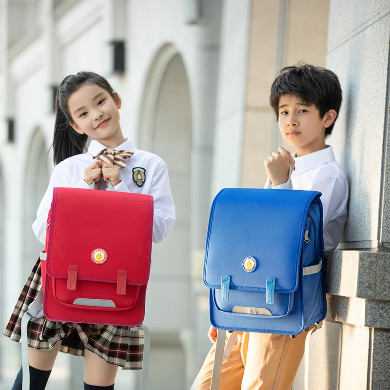 麦咭金鹰卡通学院风护脊减负书包小学生四到六年级男女儿童英伦