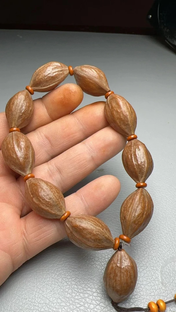 梅林老油核鸡血红原皮手串橄榄核