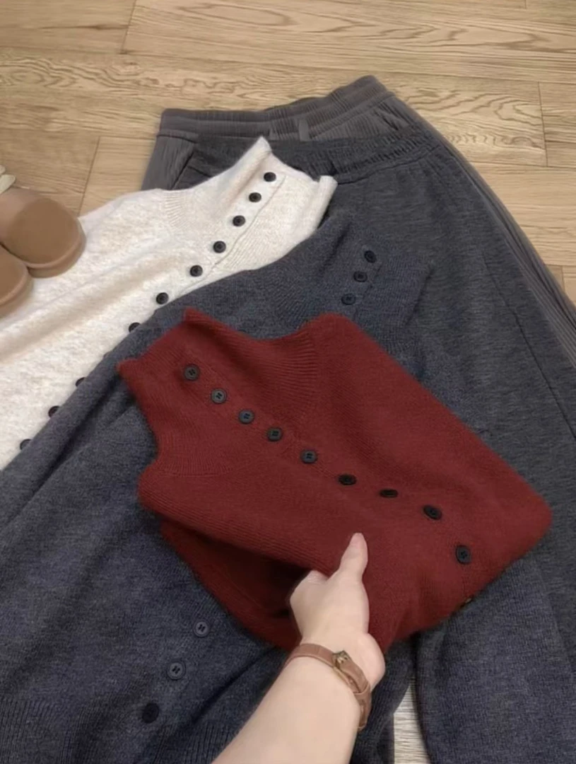七言家纯色多扣高领长袖开衫毛衣1