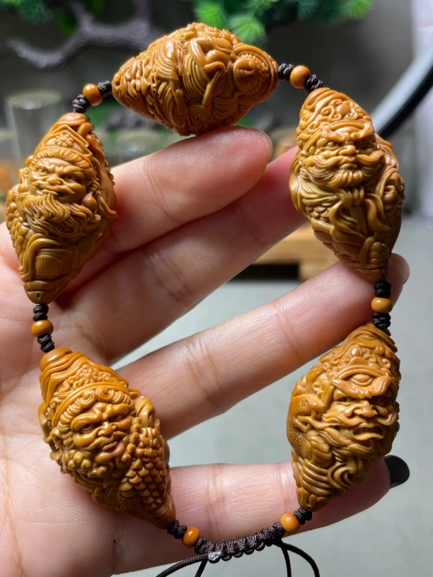 精品橄榄核雕文玩手串2.1满工雕刻四大天王四大金刚风调雨顺。