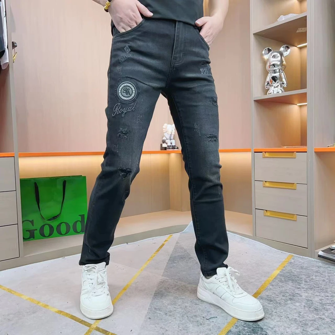 男士2024秋冬新款潮流牛仔裤个性时尚刺绣破洞补丁百搭修身小脚裤