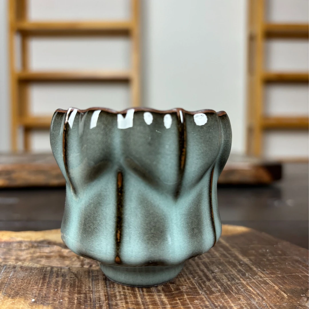 承玉青龙泉青瓷铁胎佛手主人杯