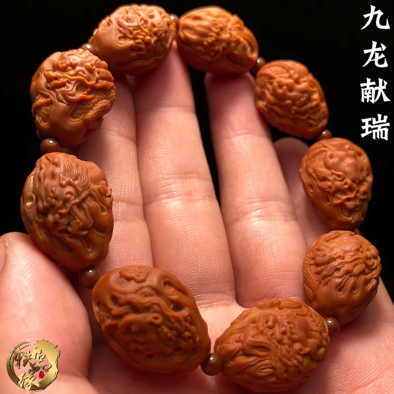 九龙戏珠男士橄榄核手串男款高端文玩龙珠纯手工雕刻龙生九子精雕
