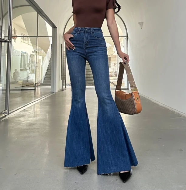 2025新款显腿长包臀深蓝色高腰大喇叭牛仔裤欧美鱼尾毛边裤脚潮女