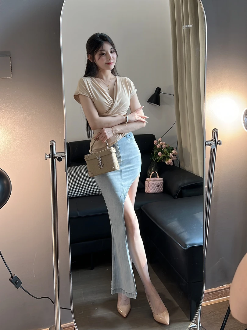 希野逸儿/气质性感韩版显瘦不规则开叉下摆包臀丰胯牛仔半身裙女