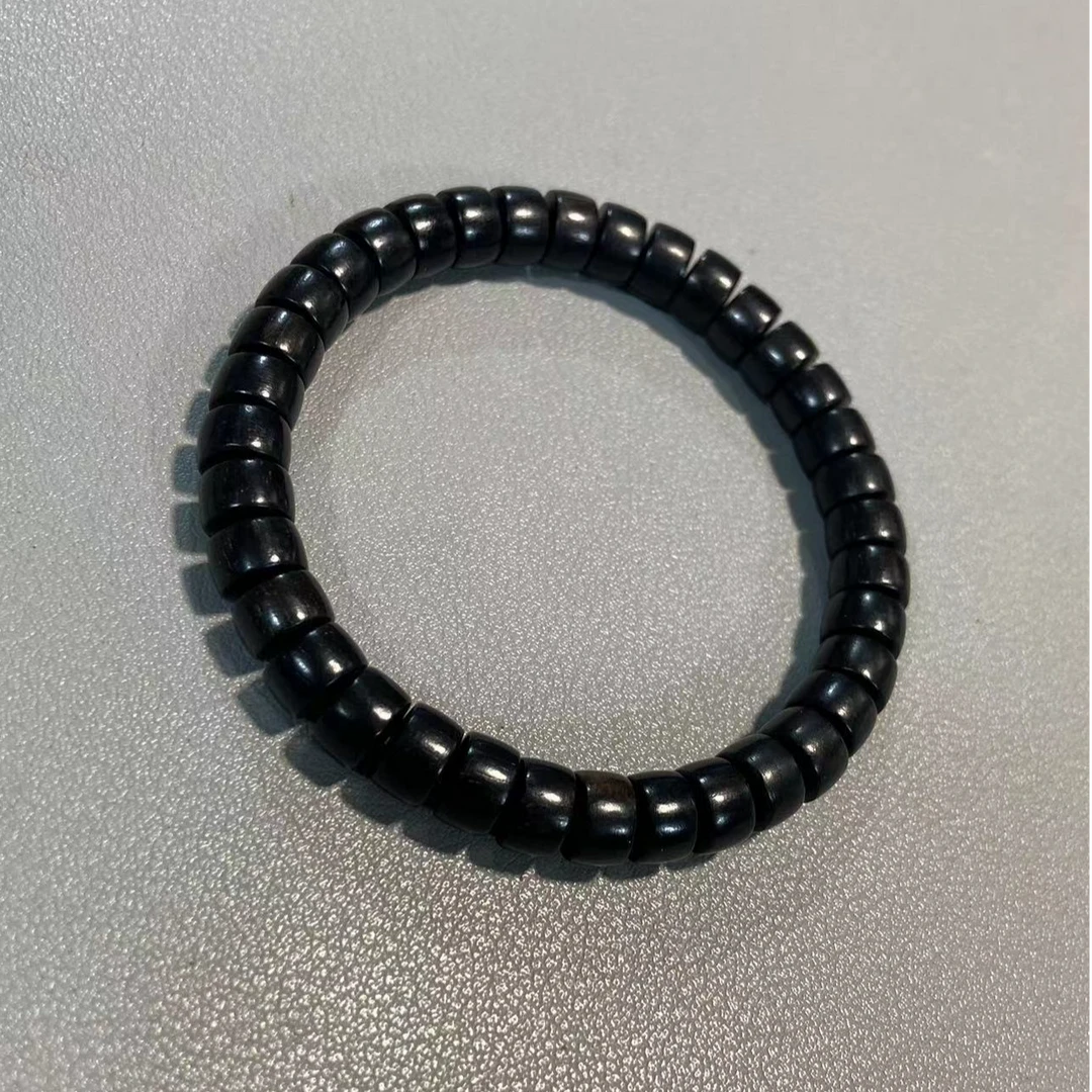 W645黑檀木卡0.8药片单圈手串