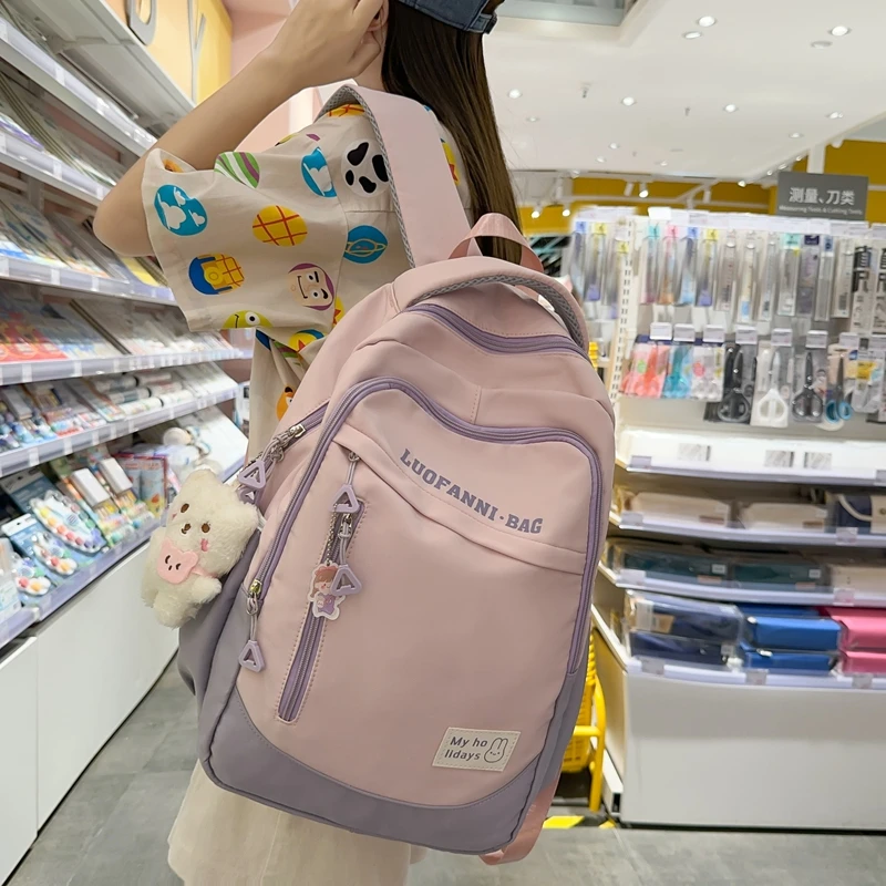 书包初中女生高中生大容量旅行双肩包大学生2023新款轻便简约背包