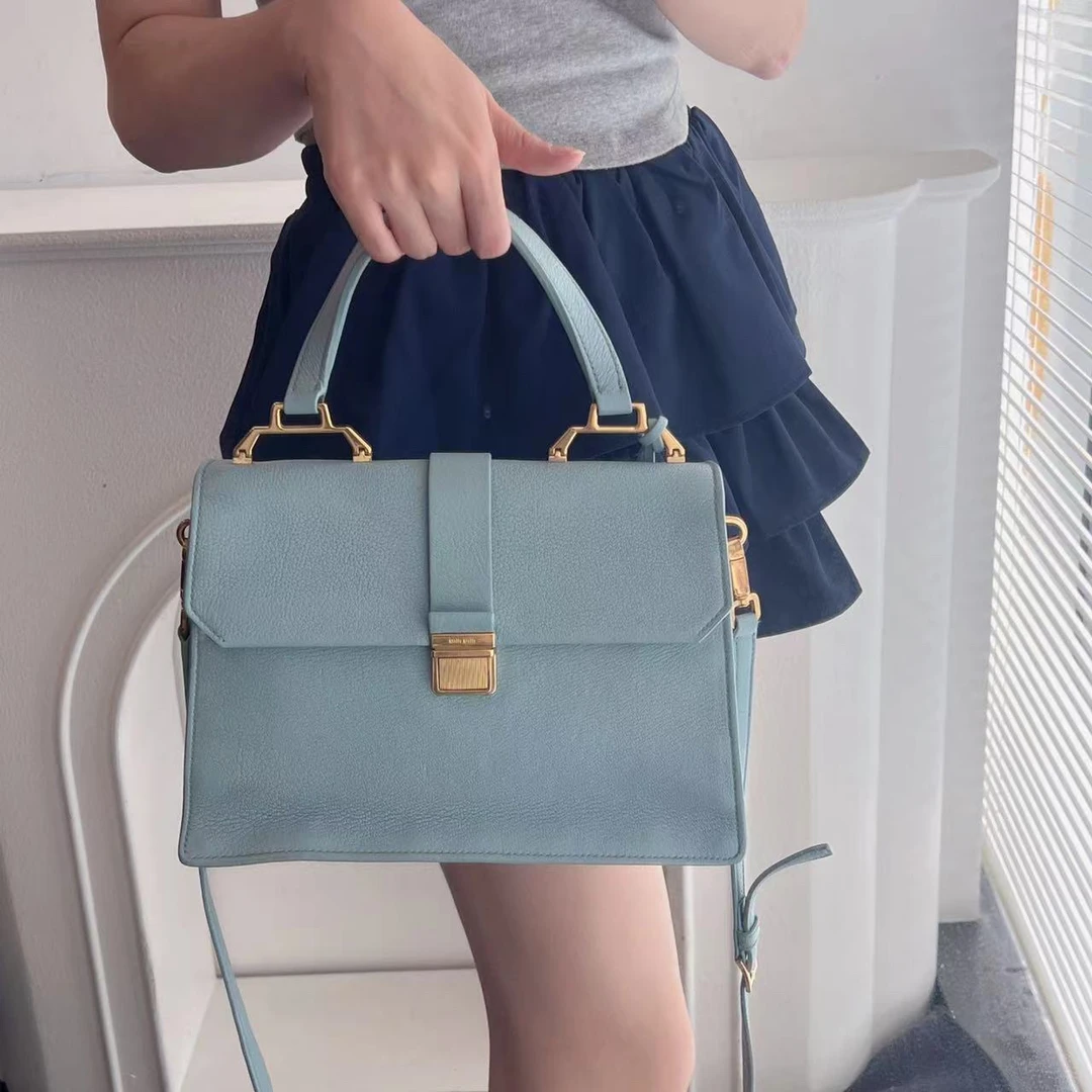 95新 MIU MIU/缪缪 小花手提斜挎包