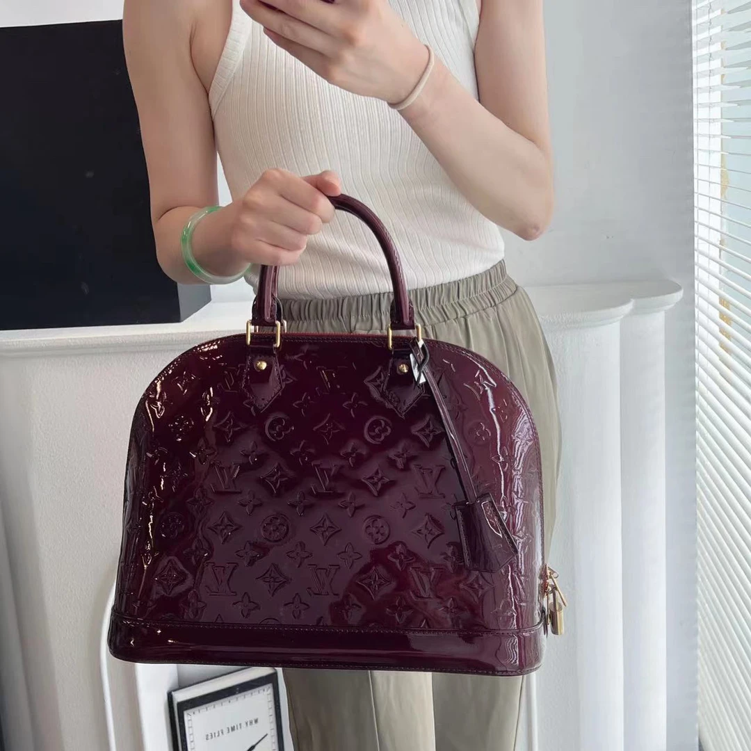 95新 LouisVuitton/路易威登 小花贝壳手提包